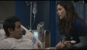 Still of Matt Medrano and Sophia Bush on set of Good Sam