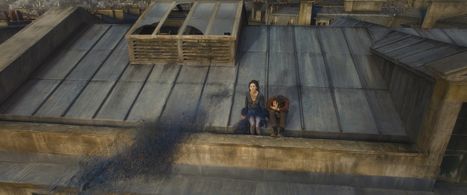 Claudia Kim and Ezra Miller in Fantastic Beasts: The Crimes of Grindelwald (2018)