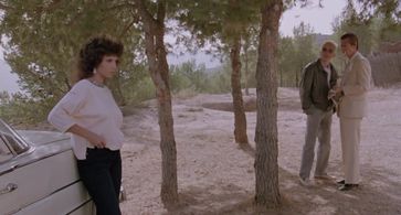 John Hurt, Tim Roth, and Laura del Sol in The Hit (1984)