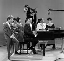 Dean Martin, Maxene Andrews, Tim Conway, Duke Ellington, Frank Gorshin, Lainie Kazan, and The Andrews Sisters in The Dea