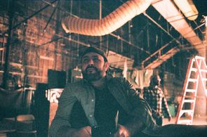 Jason Ensler on the set of Redliners for NBC