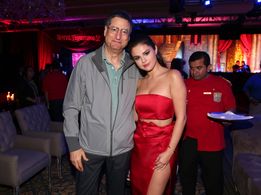 Tom Rothman and Selena Gomez