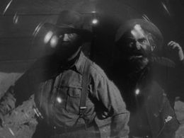 Edgar Dearing and Casey MacGregor in It Came from Outer Space (1953)