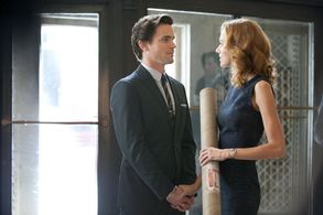 Matt Bomer and Hilarie Burton in White Collar (2009)