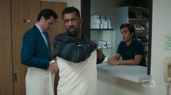 Still shot of Marc Fajardo in 'Angie Tribeca'