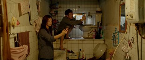 Choi Woo-sik and Park So-dam in Parasite (2019)