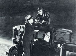 Karl Dane, Malcolm McGregor, Jack Perrin, and Max Wagner in The Whispering Shadow (1933)