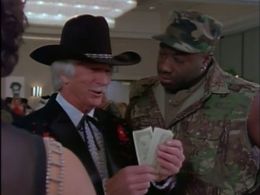 Michael Clarke Duncan and L.Q. Jones in Renegade (1992)