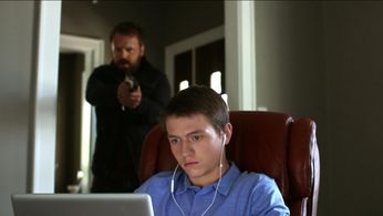 Still of Hunter Foretich and Simon Phillips in Dystopia (2019)