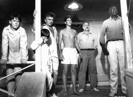 Hart Bochner, George C. Scott, Julius Harris, David Hemmings, Brad Savage, and Michael-James Wixted in Islands in the St