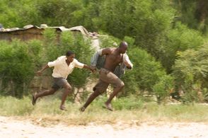Djimon Hounsou and Kagiso Kuypers in Blood Diamond (2006)