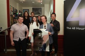 (R-L) Actor Euan Alexander, child actress Elizabeth Beattie and Jacob Pettifer pose with film crew before the premiere o