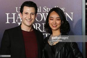 Matthew Bohrer (L) and Emily Song (R) attends the opening night celebration of 'Halloween Horror Nights' at Universal St