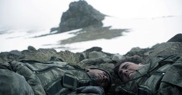 Ufuk Bayraktar and Caglar Ertugrul in The Mountain (2012)