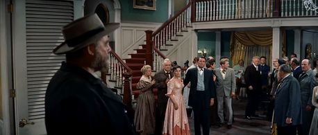 Charlton Heston, Gregory Peck, Jean Simmons, Charles Bickford, Carroll Baker, Richard Alexander, Rudy Bowman, and Burl I