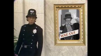 Dennis Allen and Richard Dawson in Rowan & Martin's Laugh-In (1967)