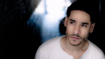 Screen Shot from The Promotion Written and Produced by Stephen Herman David Chin for Broken Box, Inc.