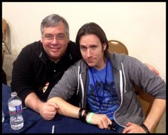 Signing autographs at MAGFest Matthew Mercer.