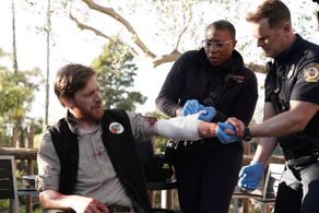 Peter Krause, Aisha Hinds, and Brian Maillard in 9-1-1 (2018)