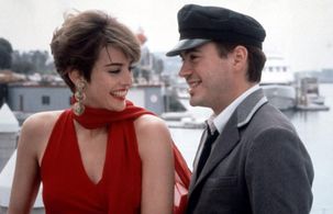 Robert Downey Jr. and Laura Ernst in Too Much Sun (1990)