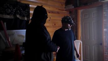 Steven as the Masked Villain shaking hands with The Slicer