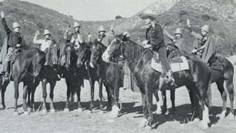 Gene Autry, Frankie Darro, and Betsy King Ross in Men with Steel Faces (1940)
