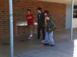 The whole group of kids on the set of Joss Whedon's film 