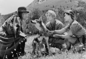 Scott Bairstow and Charmaine Craig in White Fang 2: Myth of the White Wolf (1994)