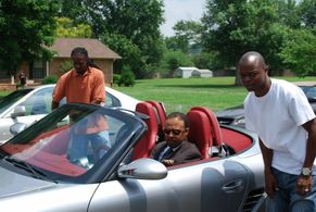 Walter Colson (left) as Roscoe, Quest Green (Middle) as John Monarch, T. Black (right) Director on the set of Stand.