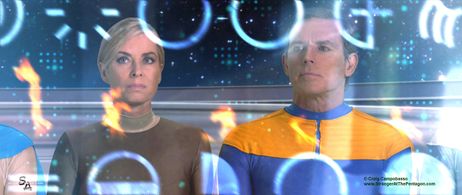 Valiant Thor (Jeff Joslin) reads the Language of the Gods. Eileen Davidson plays his wife Deena Thor.