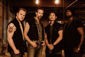 Garfield Wilson, Nelson Leis, Ryan Cowie, and Curtis Lum in A.T.A.C.K (2022)