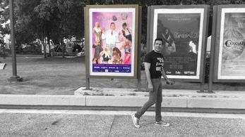 Johnny Ray passes by his show poster. Esto Si Es Un Show.