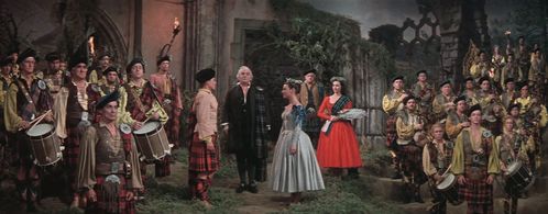 Cyd Charisse, Virginia Bosler, Barry Jones, Hugh Laing, Tudor Owen, Albert Sharpe, and Jimmy Thompson in Brigadoon (1954