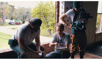 Eric Kuritz, Ryan Staples Scott, and James Britt in Robot Riot (2020)