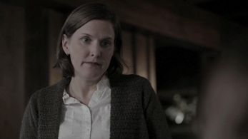 Erin Bradley Dangar as Detective Amy Moore in Murder Comes to Town, 