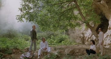 John Hurt, Tim Roth, Terence Stamp, and Laura del Sol in The Hit (1984)