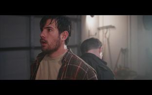 Noah Archibald in What Lies Within (2023)