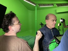 Nathan doing touchups on Robert Picardo on set of To Meet The Faces You Meet
