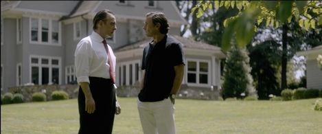 Paul Spriggs [R] as Ivan Boesky and Eric Rolland as Michael Milken - Titans: The Rise of Wall St