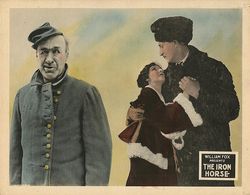 Cyril Chadwick, Gladys Hulette, and J. Farrell MacDonald in The Iron Horse (1924)