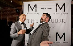 Chris Oliver and director Jerry J. White III having fun at the premiere of 