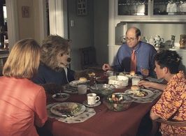 Beary (center left) breaks bread with his overbearing family - his mother (Meagen Fay, left),father (Stephen Tobolowsky