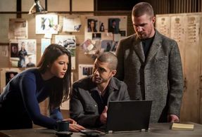 Rick Gonzalez, Stephen Amell, and Sea Shimooka in Arrow (2012)