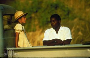 Isaach De Bankolé and Cécile Ducasse in Chocolat (1988)