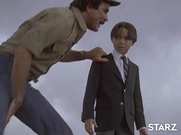 Tom Selleck and Roland Harrah III in Magnum, P.I. (1980)