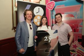 (L-R) Actor Euan Alexander, child actress Elizabeth Beattie and Jacob Pettifer pose with film poster before the premiere