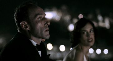 Dolores Chaplin and Karl Markovics in The Counterfeiters (2007)