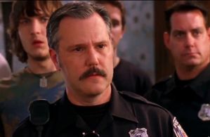 Officer Nixon in GREEK