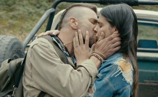 Moshe Ashkenazi and Vanessa Chaplot in When Heroes Fly (2018)