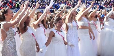 [Asian-American young woman wears a California sash]
